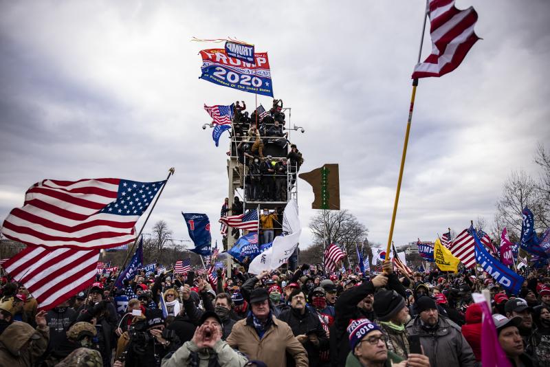 Pro-Trump supporters storm the U.S. Capitol following a rally on Jan. 6. So far, military veterans account for about 15% of those criminally charged in the Capitol riot, according to an NPR analysis. Pro-Trump supporters storm the U.S. Capitol following a rally on Jan. 6. So far, military veterans account for about 15% of those criminally charged in the Capitol riot, according to an NPR analysis.