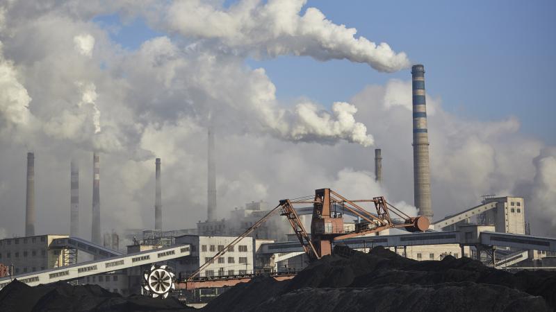 Thick clouds emanate from a coal-burning power plant in Baishan, in the Jilin province of China. In an effort to boost its economy, China has recently started greenlighting coal projects that had been on hold. Thick clouds emanate from a coal-burning power plant in Baishan, in the Jilin province of China. In an effort to boost its economy, China has recently started greenlighting coal projects that had been on hold.
