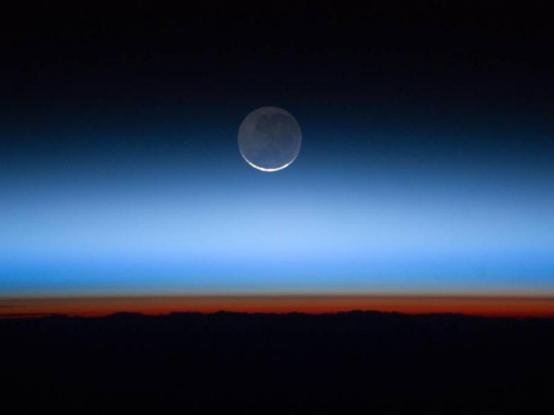 Earth's atmosphere photographed from the International Space Station. Greenhouse gases have accumulated rapidly and are trapping extra heat in the atmosphere. It will take decades for the gases to break down naturally or be reabsorbed on Earth's surface. Earth's atmosphere photographed from the International Space Station. Greenhouse gases have accumulated rapidly and are trapping extra heat in the atmosphere. It will take decades for the gases to break down naturally or be reabsorbed on Earth's surface.