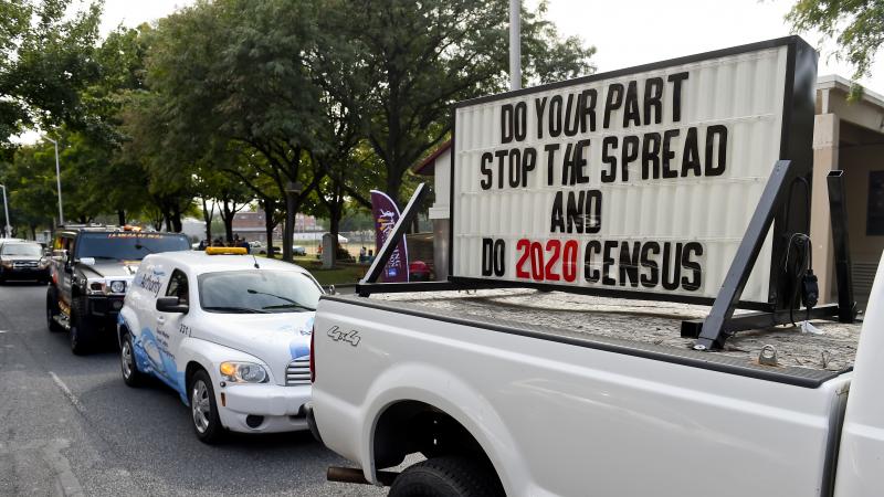 A sign on the back of a truck promotes 2020 census participation in Reading, Pa. A day after the Census Bureau announced a new "target date" for ending counting efforts, a federal judge in California said she thinks the schedule is "a violation" of her co A sign on the back of a truck promotes 2020 census participation in Reading, Pa. A day after the Census Bureau announced a new "target date" for ending counting efforts, a federal judge in California said she thinks the schedule is "a violation" of her co