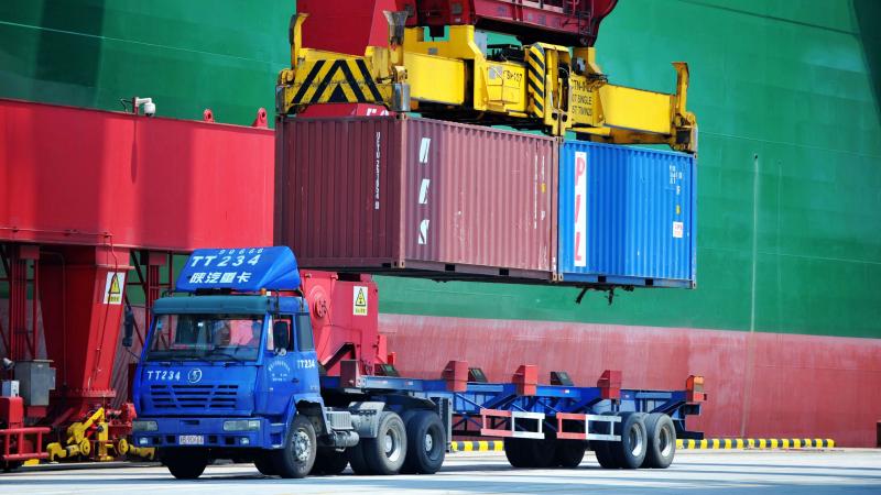 Containers are transferred at a port in Qingdao in China's eastern Shandong province on July 6. China has announced a plan to impose more tariffs on U.S. goods, in response to escalating trade threats from the Trump administration. Containers are transferred at a port in Qingdao in China's eastern Shandong province on July 6. China has announced a plan to impose more tariffs on U.S. goods, in response to escalating trade threats from the Trump administration.