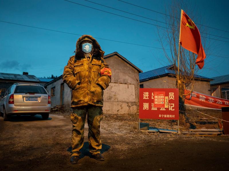 A staff member keeping watch at a checkpoint in Suifenhe, a city on the border with Russia in China's northeastern Heilongjiang province, on Tuesday. A staff member keeping watch at a checkpoint in Suifenhe, a city on the border with Russia in China's northeastern Heilongjiang province, on Tuesday.