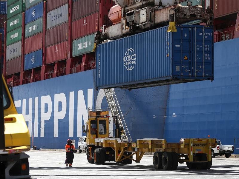 A shipping container is offloaded from the Hong Kong-based ship in Oakland, Calif., last month. A shipping container is offloaded from the Hong Kong-based ship in Oakland, Calif., last month.
