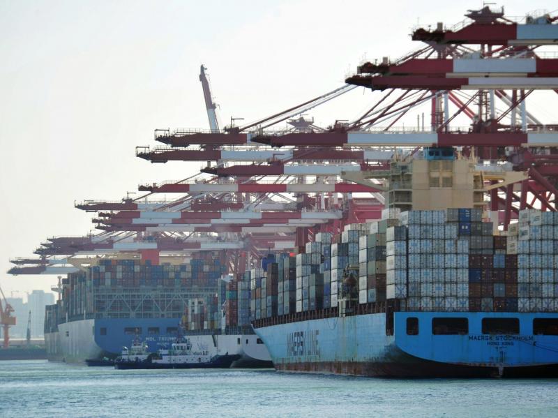 Cargo containers are loaded on ships at a port in Qingdao in China's eastern Shandong province in April. China said it will impose tariffs of 5 percent to 10 percent on $60 billion worth of U.S. products, starting on Monday. Cargo containers are loaded on ships at a port in Qingdao in China's eastern Shandong province in April. China said it will impose tariffs of 5 percent to 10 percent on $60 billion worth of U.S. products, starting on Monday.
