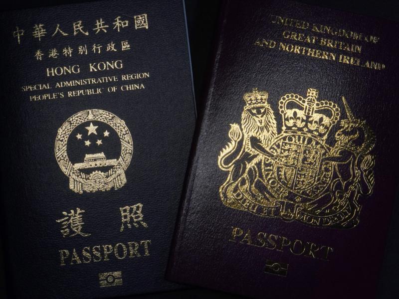 A British National Overseas passport (right) and China's Hong Kong Special Administrative Region passport. China said Friday it will no longer recognize the BNO passport as a valid travel document or form of identification. A British National Overseas passport (right) and China's Hong Kong Special Administrative Region passport. China said Friday it will no longer recognize the BNO passport as a valid travel document or form of identification.