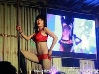 A screenshot of a striptease act at a funeral in February in China's Hebei province. A screenshot of a striptease act at a funeral in February in China's Hebei province.
