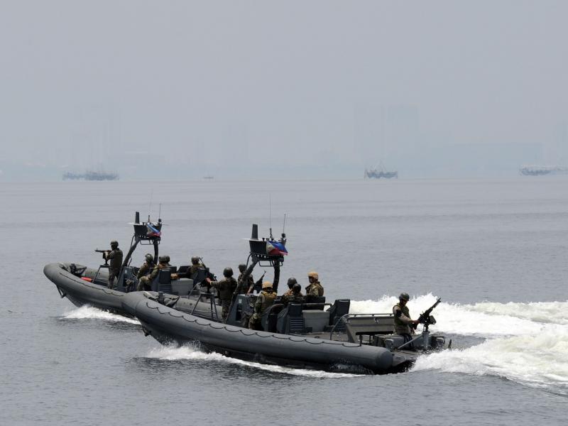 U.S. and Philippine navy personnel patrol the seas off a naval base west of Manila in June as part of joint exercises. U.S. and Philippine navy personnel patrol the seas off a naval base west of Manila in June as part of joint exercises.