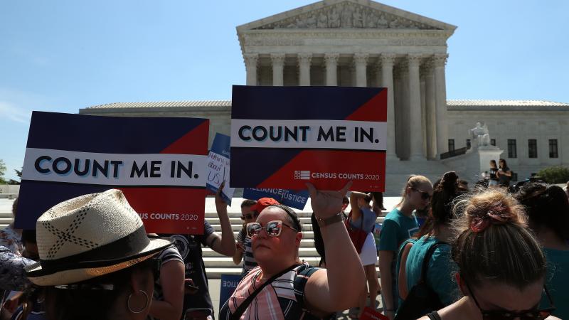 People gather in front of the U.S. Supreme Court last month as decisions are handed down, including on the census. People gather in front of the U.S. Supreme Court last month as decisions are handed down, including on the census.