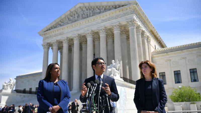 ACLU's Voting Rights Project Director Dale Ho (center) speaks outside the U.S. Supreme Court in April after arguing on behalf of plaintiffs in the lawsuits over the citizenship question the Trump administration wants to add to the 2020 census. ACLU's Voting Rights Project Director Dale Ho (center) speaks outside the U.S. Supreme Court in April after arguing on behalf of plaintiffs in the lawsuits over the citizenship question the Trump administration wants to add to the 2020 census.