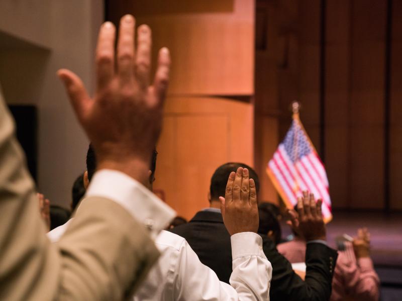 Newly sworn-in U.S. citizens gather for a naturalization ceremony at the Rachel M. Schlesinger Concert Hall and Arts Center in Alexandria, Va., in August. The Trump administration is planning to include a question about U.S. citizenship status on the 2020 Newly sworn-in U.S. citizens gather for a naturalization ceremony at the Rachel M. Schlesinger Concert Hall and Arts Center in Alexandria, Va., in August. The Trump administration is planning to include a question about U.S. citizenship status on the 2020