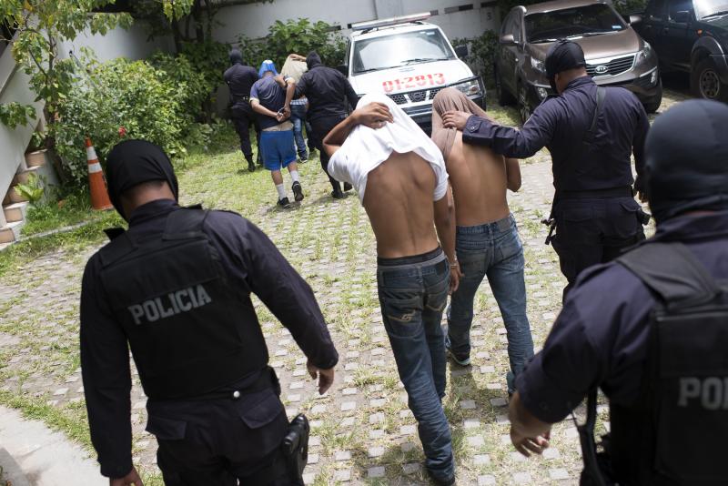 Police arrest gang members suspected of involvement in the shootings that killed eight bus drivers and one other transit worker in San Salvador last July. Police arrest gang members suspected of involvement in the shootings that killed eight bus drivers and one other transit worker in San Salvador last July.