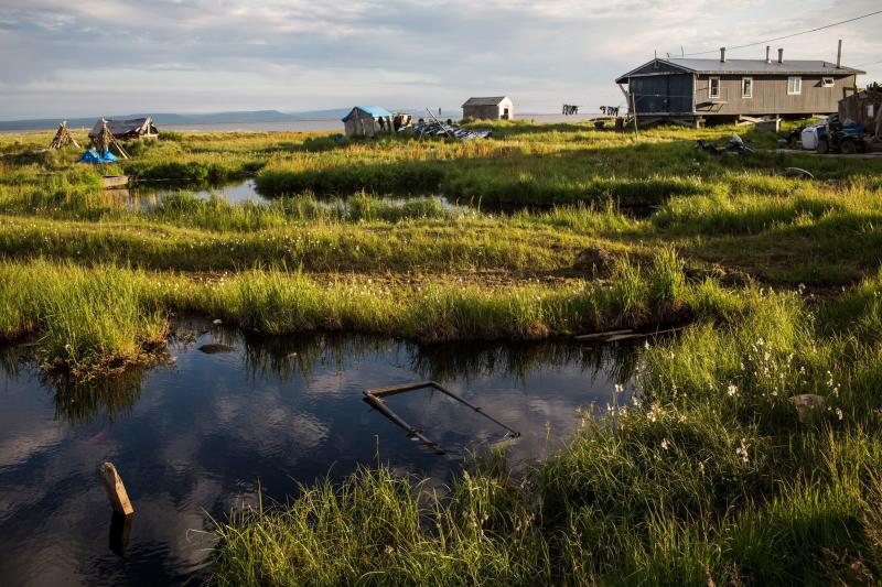 Rising temperatures in Alaska are melting permafrost, widening rivers and eroding homes in the remote village of Newtok, where about a third of residents relocated to higher ground last year. Rising temperatures in Alaska are melting permafrost, widening rivers and eroding homes in the remote village of Newtok, where about a third of residents relocated to higher ground last year.