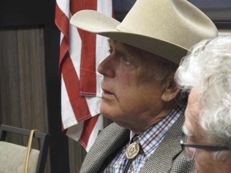 Cliven Bundy listens to other speakers before giving the keynote address to the state convention of the Independent American Party of Nevada, in February 2018. Cliven Bundy listens to other speakers before giving the keynote address to the state convention of the Independent American Party of Nevada, in February 2018.