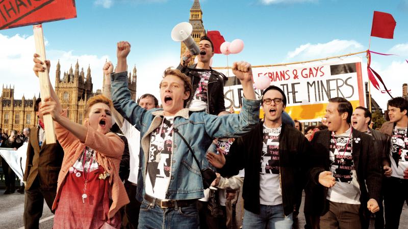 Faye Marsay, George MacKay, Joseph Gilgun and Paddy Considine play a group of London activists who march in support of Welsh miners. Faye Marsay, George MacKay, Joseph Gilgun and Paddy Considine play a group of London activists who march in support of Welsh miners.