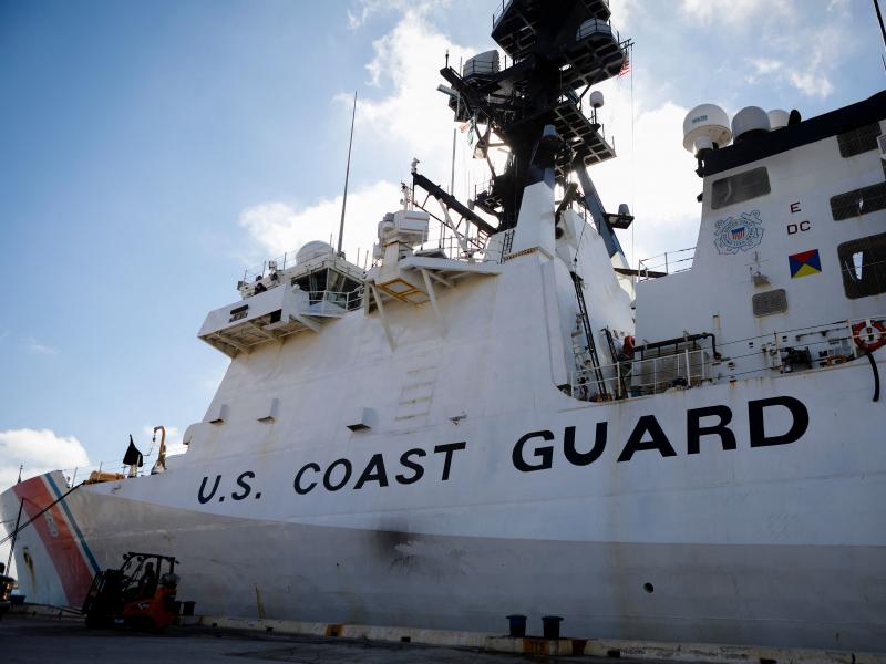 A Coast Guard vessel docks in Fort Lauderdale, Florida on Nov. 22, 2021. The Guard says it is searching for 39 people who went missing after their vessel reportedly capsized on Saturday. A Coast Guard vessel docks in Fort Lauderdale, Florida on Nov. 22, 2021. The Guard says it is searching for 39 people who went missing after their vessel reportedly capsized on Saturday.