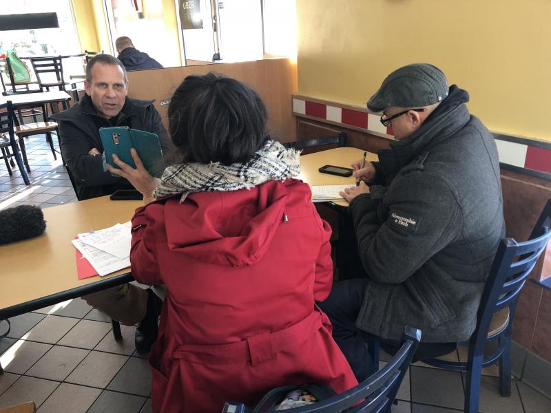 Nick Selby and NYPD officer Luis Sayan interview a retired New York City teacher who lost more than $300,000 to online scammers posing as Chinese police. Nick Selby and NYPD officer Luis Sayan interview a retired New York City teacher who lost more than $300,000 to online scammers posing as Chinese police.