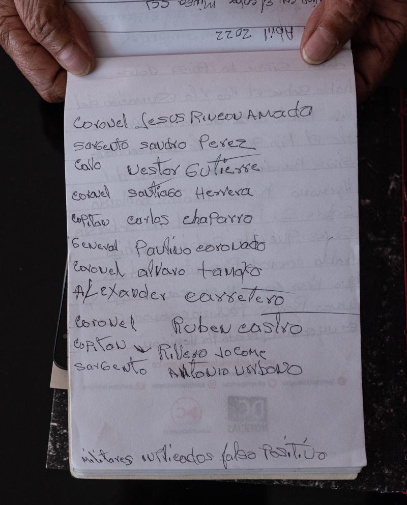 A notepad shows a list of the military officers who spoke at the special tribunal hearing in Ocaña. A notepad shows a list of the military officers who spoke at the special tribunal hearing in Ocaña.