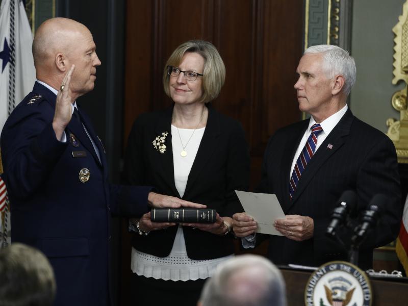 Vice President Pence (right) swears in Air Force Gen. John Raymond as Chief of Space Operations on Tuesday. Vice President Pence (right) swears in Air Force Gen. John Raymond as Chief of Space Operations on Tuesday.