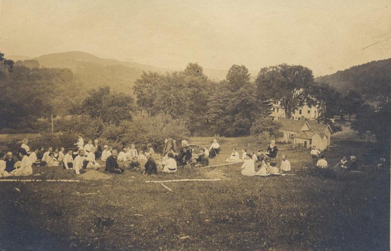 Community members enjoy a picnic on Gould Farm in Monterey, Mass., in the 1920s. Work on the farm remains a key part of the therapeutic process. Community members enjoy a picnic on Gould Farm in Monterey, Mass., in the 1920s. Work on the farm remains a key part of the therapeutic process.