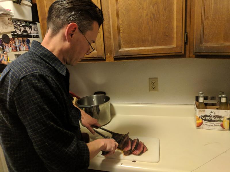 Patrick States slices into a venison steak at his home in Northglenn, Colo. Officials are asking hunters to have their kills tested before consuming the meat. Patrick States slices into a venison steak at his home in Northglenn, Colo. Officials are asking hunters to have their kills tested before consuming the meat.