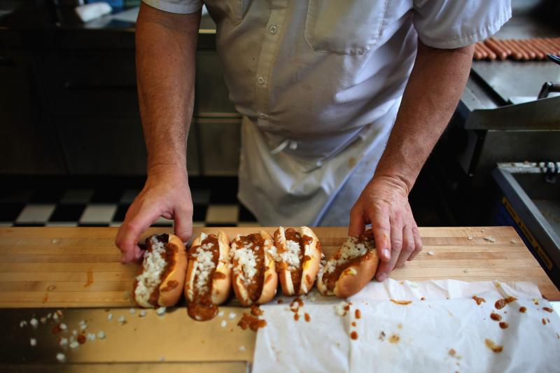 Rich Harlan prepares Coney hot dogs at his restaurant, Red Hots Coney Island, in Detroit. Harlan has been working at the restaurant for 48 years. Rich Harlan prepares Coney hot dogs at his restaurant, Red Hots Coney Island, in Detroit. Harlan has been working at the restaurant for 48 years.