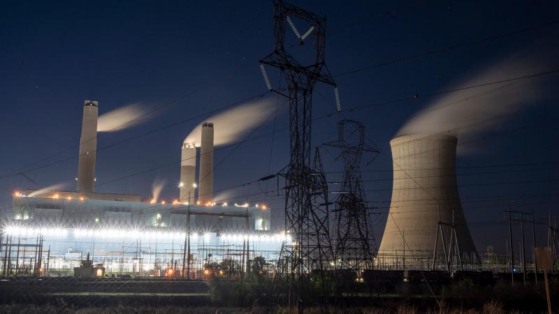 Steam rises from the Miller coal power plant in Adamsville, Ala., in April. An industry group says a climate plan in Congress would shut down all U.S. coal plants by 2030 or earlier. Steam rises from the Miller coal power plant in Adamsville, Ala., in April. An industry group says a climate plan in Congress would shut down all U.S. coal plants by 2030 or earlier.