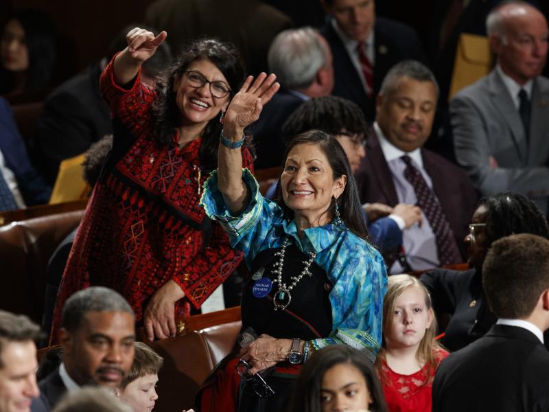 Rep. Rashida Tlaib (left) and Rep. Deb Haaland look up to the gallery at the U.S. Capitol on Thursday, their first day as members of Congress. Rep. Rashida Tlaib (left) and Rep. Deb Haaland look up to the gallery at the U.S. Capitol on Thursday, their first day as members of Congress.