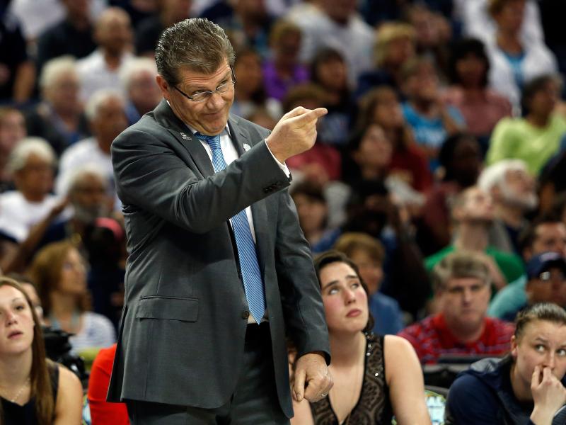 Head coach Geno Auriemma of the Connecticut Huskies calls to his players in the first half against the Notre Dame Fighting Irish. Head coach Geno Auriemma of the Connecticut Huskies calls to his players in the first half against the Notre Dame Fighting Irish.