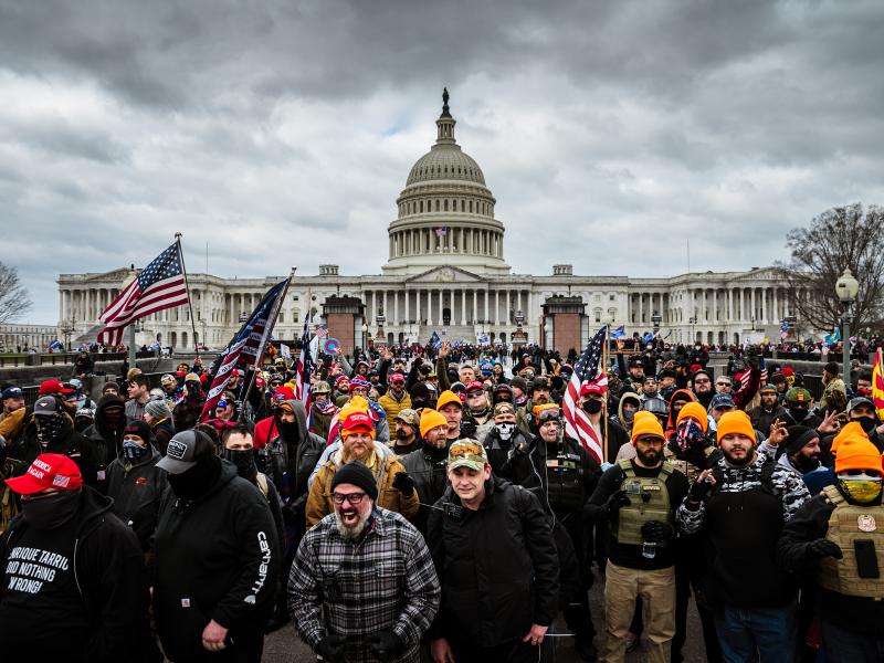 Pro-Trump rioters, including members of the far-right extremist group the Proud Boys, gather near the U.S. Capitol on Jan. 6. At least 25 people charged in the attack appear to have links to the Proud Boys, according to court documents. Pro-Trump rioters, including members of the far-right extremist group the Proud Boys, gather near the U.S. Capitol on Jan. 6. At least 25 people charged in the attack appear to have links to the Proud Boys, according to court documents.