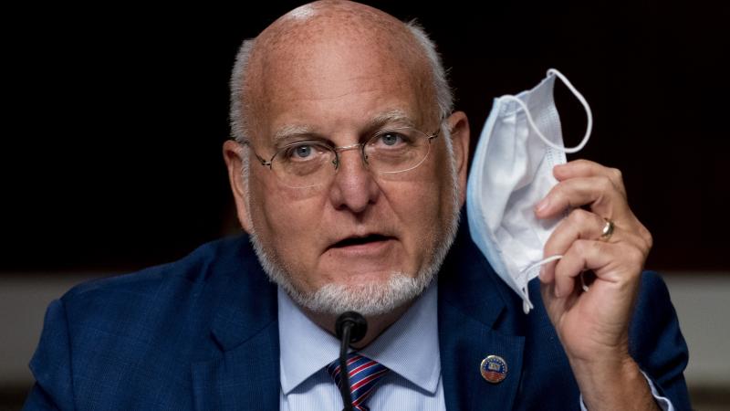 CDC Director Robert Redfield says wearing a mask may provide better protection against COVID-19 than a vaccine. CDC Director Robert Redfield says wearing a mask may provide better protection against COVID-19 than a vaccine.