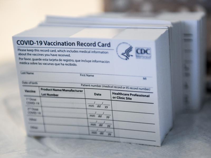 A stack of COVID-19 vaccination record cards from the Centers for Disease Control and Prevention. They provide proof that you've had your shot — but aren't exactly wallet size at 4 by 3 inches. A stack of COVID-19 vaccination record cards from the Centers for Disease Control and Prevention. They provide proof that you've had your shot — but aren't exactly wallet size at 4 by 3 inches.