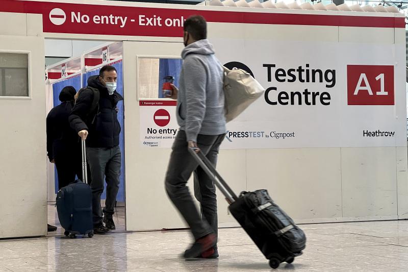 Passengers get a COVID test at Heathrow Airport in London in November 2021. On June 12, the Centers for Disease Control and Prevention lifted its requirement for pre-departure testing for travelers flying into the U.S. Passengers get a COVID test at Heathrow Airport in London in November 2021. On June 12, the Centers for Disease Control and Prevention lifted its requirement for pre-departure testing for travelers flying into the U.S.