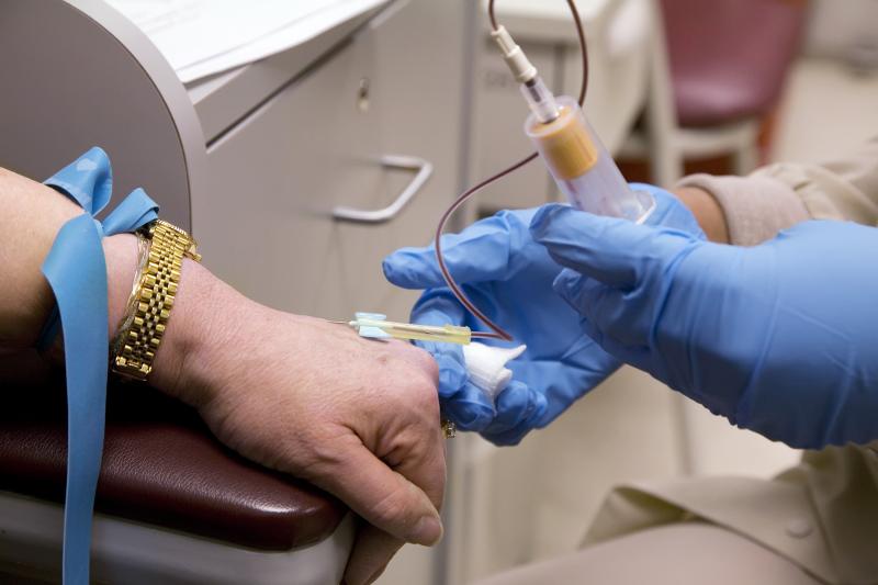 A phlebotomist draws blood from a patient participating in a clinical trial for a cancer treatment. With hospitals focused on COVID-19, hundreds of studies are being put on hold. A phlebotomist draws blood from a patient participating in a clinical trial for a cancer treatment. With hospitals focused on COVID-19, hundreds of studies are being put on hold.