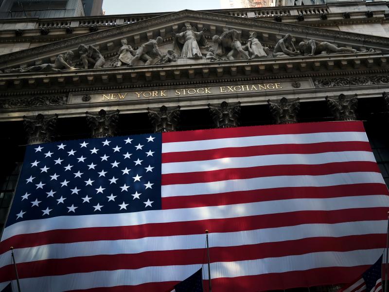 Citigroup estimates the U.S. economy lost $16 trillion over the past 20 years as a result of discrimination against African Americans. Above, the American flag hangs in front of the New York Stock Exchange on Sept. 21. Citigroup estimates the U.S. economy lost $16 trillion over the past 20 years as a result of discrimination against African Americans. Above, the American flag hangs in front of the New York Stock Exchange on Sept. 21.