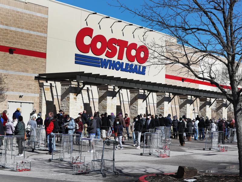 People wait to shop at a Costco in Texas on Feb. 20. Next week's pay increase would put Costco ahead of much of the industry. People wait to shop at a Costco in Texas on Feb. 20. Next week's pay increase would put Costco ahead of much of the industry.