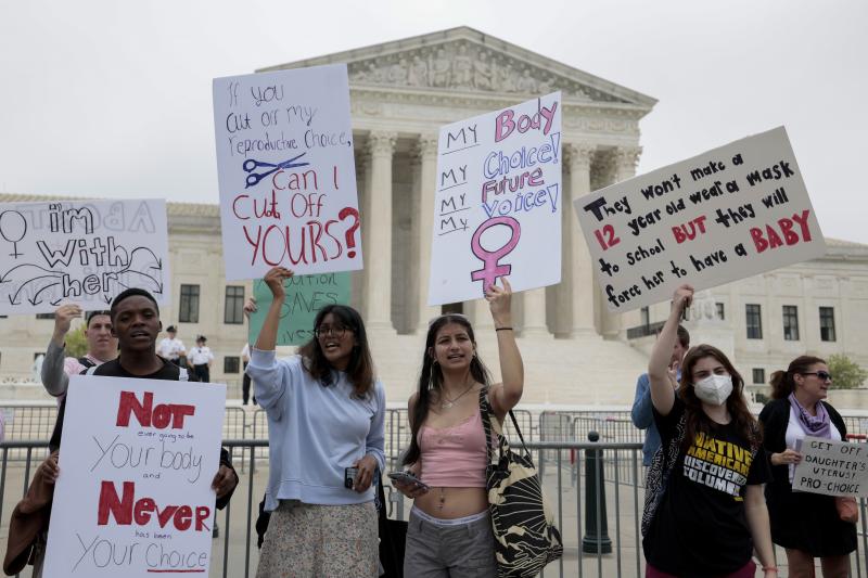 Abortion-rights supporters demonstrate in front of the Supreme Court on Wednesday in Washington, D.C. Abortion-rights supporters demonstrate in front of the Supreme Court on Wednesday in Washington, D.C.
