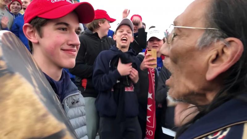 The family of Nicholas Sandmann, 16, is suing The Washington Post, accusing the newspaper of targeting the Covington Catholic High School student for political purposes. Sandmann is seen here along with Native American activist Nathan Phillips on Jan. 18. The family of Nicholas Sandmann, 16, is suing The Washington Post, accusing the newspaper of targeting the Covington Catholic High School student for political purposes. Sandmann is seen here along with Native American activist Nathan Phillips on Jan. 18.