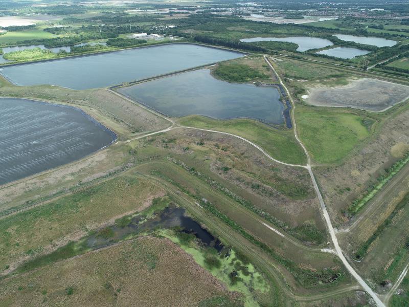 A leak at the reservoir at Piney Point, an old phosphate plant in Manatee County, Fla., as shown in an aerial photo on Saturday, has prompted evacuations, environmental concerns and threats of a full-fledged breach. A leak at the reservoir at Piney Point, an old phosphate plant in Manatee County, Fla., as shown in an aerial photo on Saturday, has prompted evacuations, environmental concerns and threats of a full-fledged breach.