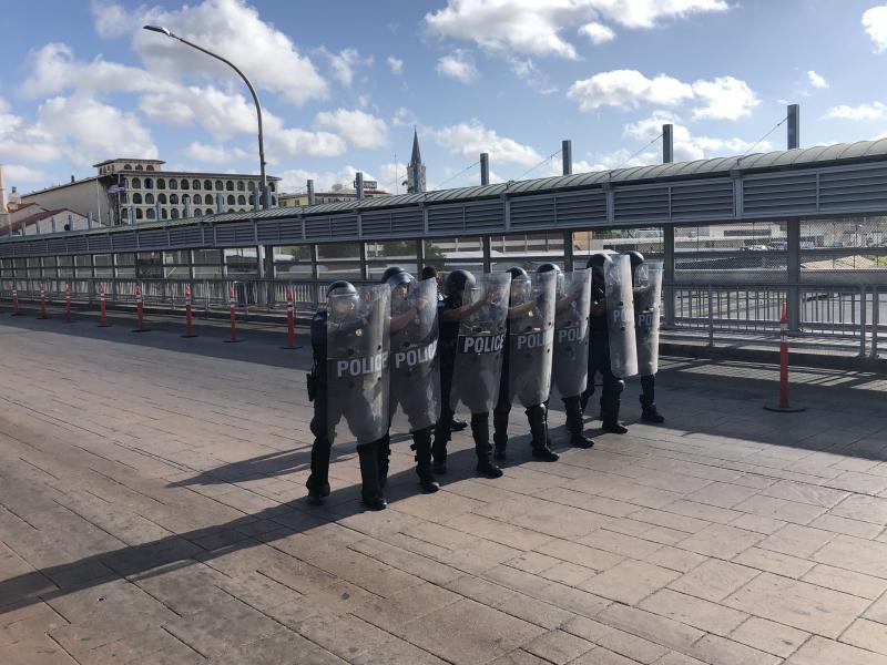 A special response team with Customs and Border Protection drills on the international bridge between Laredo, Texas, and Nuevo Laredo, Mexico, in the event that desperate migrants rush the port of entry. A special response team with Customs and Border Protection drills on the international bridge between Laredo, Texas, and Nuevo Laredo, Mexico, in the event that desperate migrants rush the port of entry.
