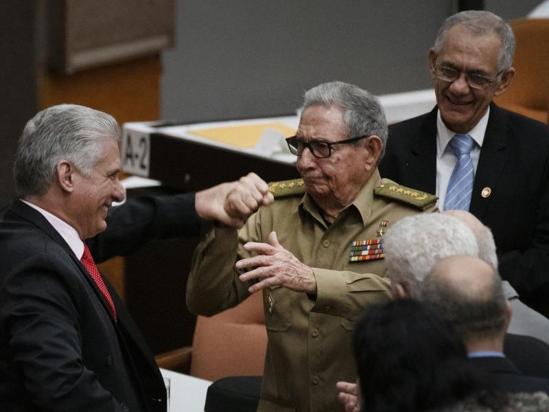 Raúl Castro, first secretary of the Cuban Communist Party and the country's former president, clasps hands with Cuban President Miguel Mario Díaz-Canel Bermúdez during the closing session at the National Assembly of Popular Power in 2019 in Havana. Raúl Castro, first secretary of the Cuban Communist Party and the country's former president, clasps hands with Cuban President Miguel Mario Díaz-Canel Bermúdez during the closing session at the National Assembly of Popular Power in 2019 in Havana.