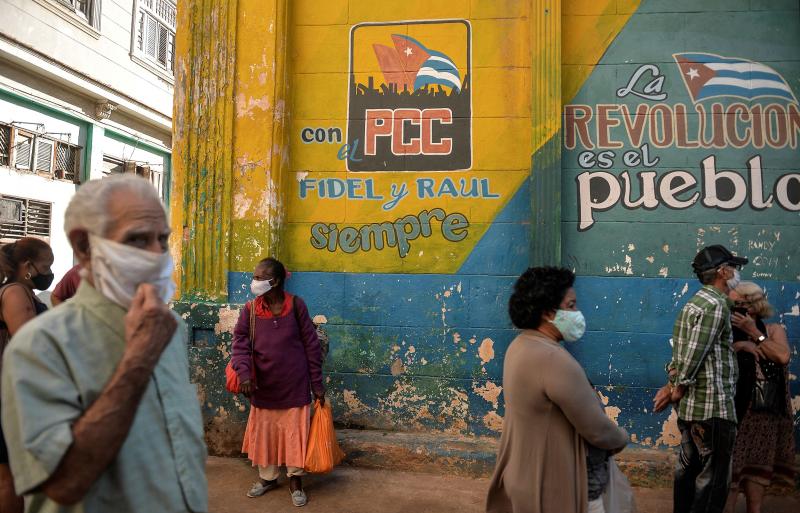 Cubans line up to buy food in Havana on March 3. The island nation is working to develop a vaccine against COVID-19. If successful, the island nation hopes to produce 1 to 2 million doses a month. Cubans line up to buy food in Havana on March 3. The island nation is working to develop a vaccine against COVID-19. If successful, the island nation hopes to produce 1 to 2 million doses a month.