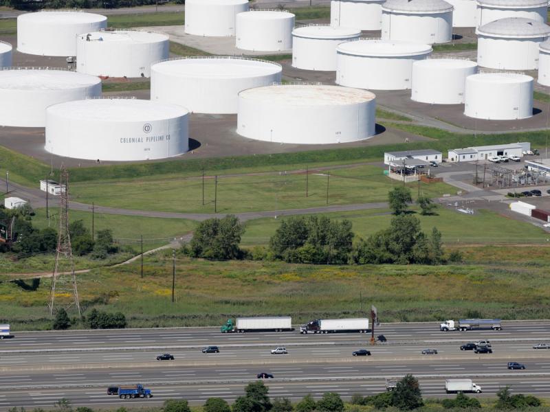 Traffic on I-95 passes oil storage tanks owned by the Colonial Pipeline Co. in Linden, N.J. An cybersecurity attack has shut down Colonial Pipeline, a major transporter of gasoline along the East Coast. Traffic on I-95 passes oil storage tanks owned by the Colonial Pipeline Co. in Linden, N.J. An cybersecurity attack has shut down Colonial Pipeline, a major transporter of gasoline along the East Coast.
