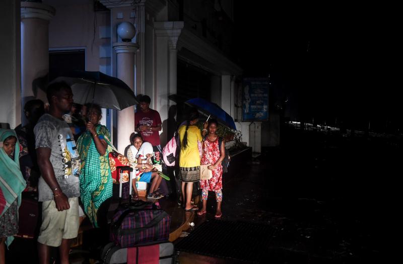 Crowds of people evacuated eastern India ahead of a major cyclone packing strong winds and torrential rains. Crowds of people evacuated eastern India ahead of a major cyclone packing strong winds and torrential rains.
