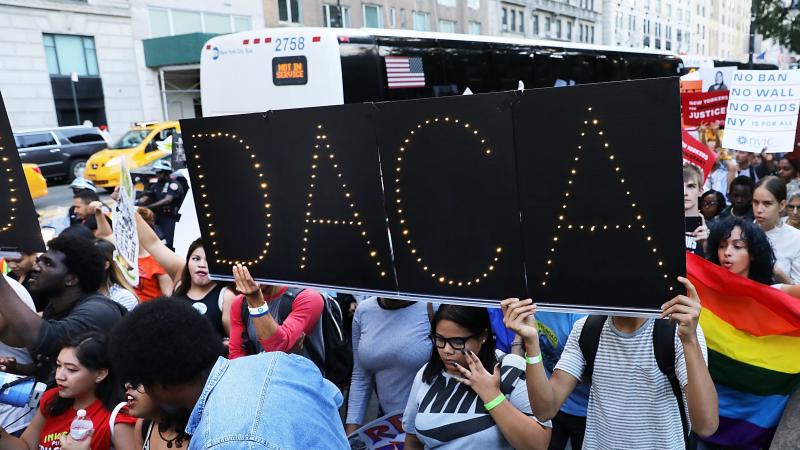 DACA advocates march near Trump Tower in August in New York City. The government says it will resume DACA renewals. DACA advocates march near Trump Tower in August in New York City. The government says it will resume DACA renewals.