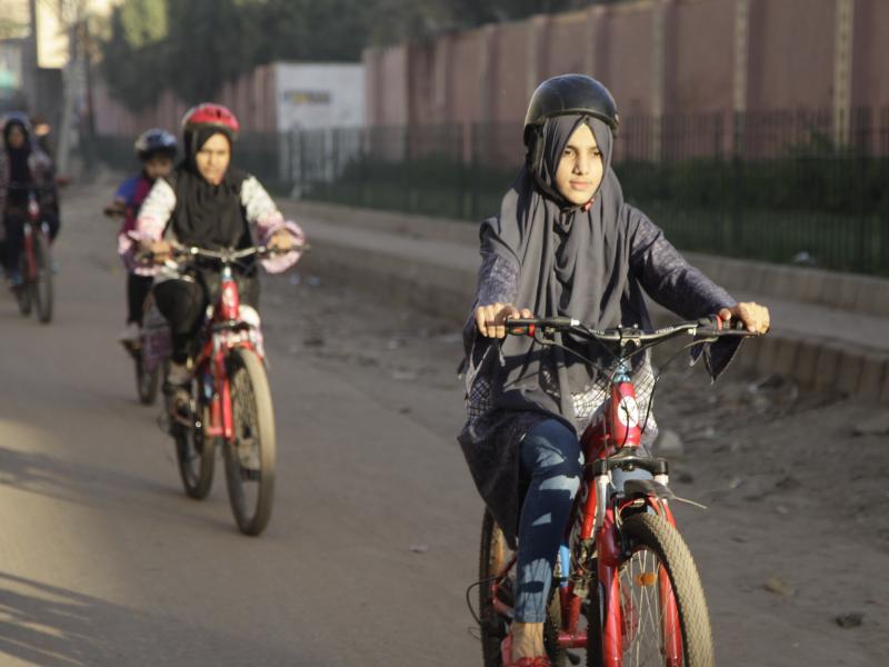 Zulekha Dawood leads female cyclists through a neighborhood in Karachi, Pakistan. They ride early in the morning to avoid the worst of traffic. Zulekha Dawood leads female cyclists through a neighborhood in Karachi, Pakistan. They ride early in the morning to avoid the worst of traffic.