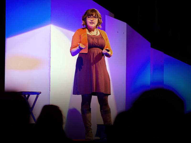 Librarian Dawn Wacek speaks from the TED stage. Librarian Dawn Wacek speaks from the TED stage.