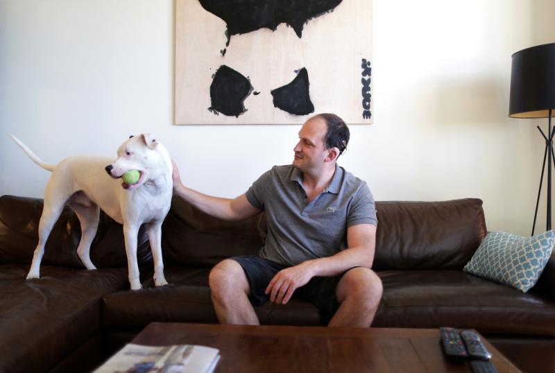 Sam Swiller and his dog, Sully, in their home in Washington, D.C. Sam Swiller and his dog, Sully, in their home in Washington, D.C.