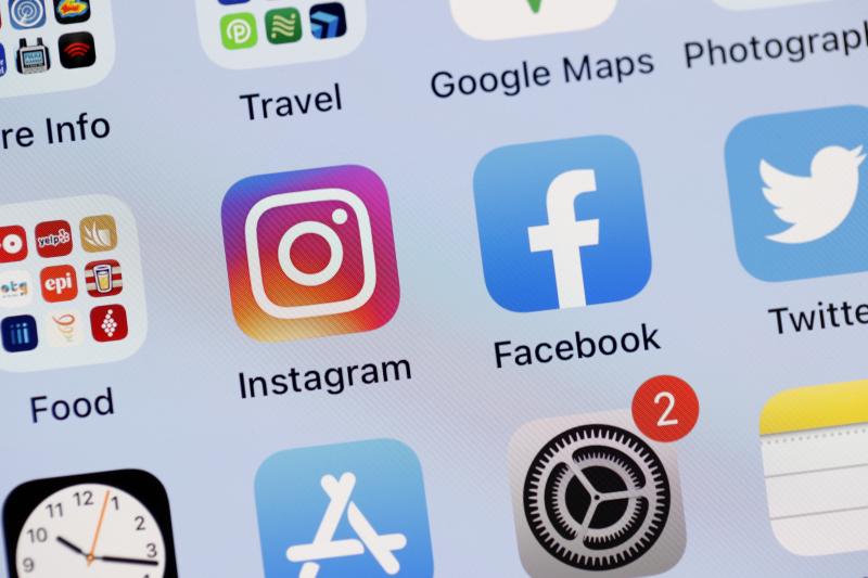 In this photo illustration, the Facebook and Instagram apps are seen on the screen of an iPhone. In this photo illustration, the Facebook and Instagram apps are seen on the screen of an iPhone.