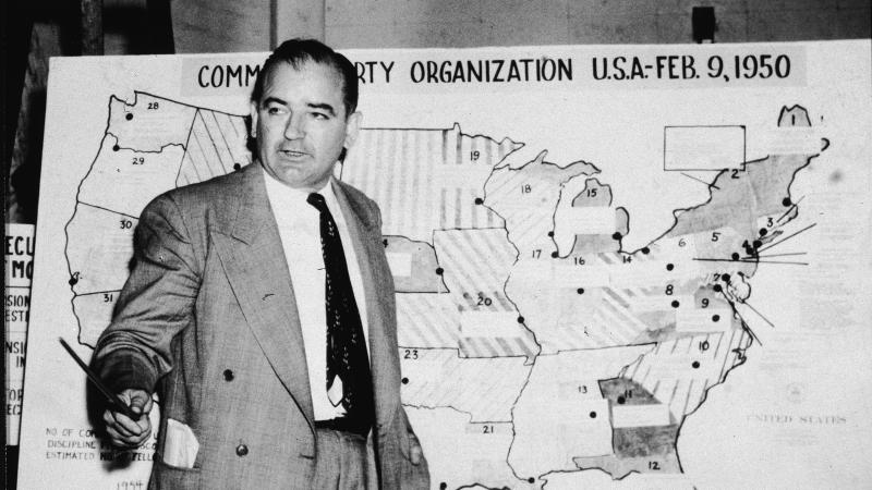 Sen. Joe McCarthy, R-Wis., testifies during hearings in Washington, D.C., on June 9, 1954. McCarthy stands before a map that charts alleged communist activity in the United States. Sen. Joe McCarthy, R-Wis., testifies during hearings in Washington, D.C., on June 9, 1954. McCarthy stands before a map that charts alleged communist activity in the United States.