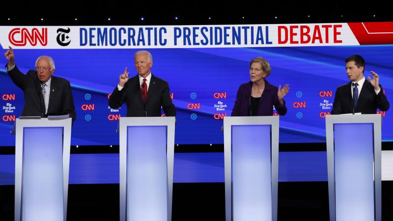 Democratic presidential candidates (from left): Sen. Bernie Sanders, former Vice President Joe Biden, Sen. Elizabeth Warren and South Bend, Ind., Mayor Pete Buttigieg during a Democratic presidential debate. Democratic presidential candidates (from left): Sen. Bernie Sanders, former Vice President Joe Biden, Sen. Elizabeth Warren and South Bend, Ind., Mayor Pete Buttigieg during a Democratic presidential debate.